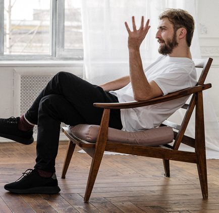 Picture of man speaking passionately to another