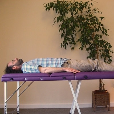 Picture of man on a healing table